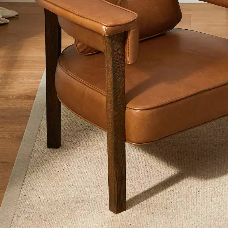 Poltrona in pelle con braccioli in legno di frassino 35,43'' x 33,46''